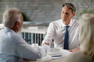 Lawyer explaining what is Alternative Dispute Resolution (ADR) in Canada to clients during a family law consultation – Moose Jaw Divorce Lawyer